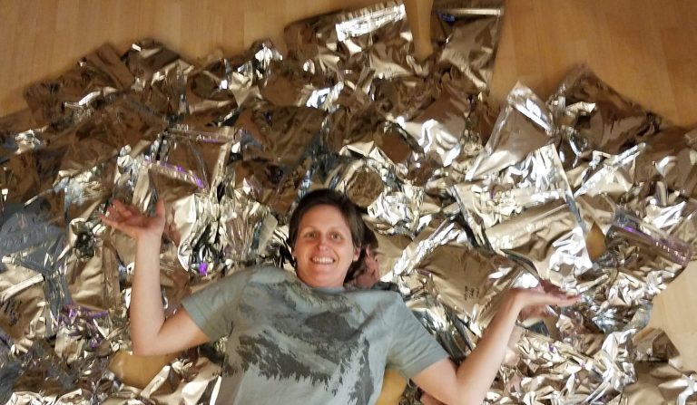Bonnie with a pile of filled Mylar bags