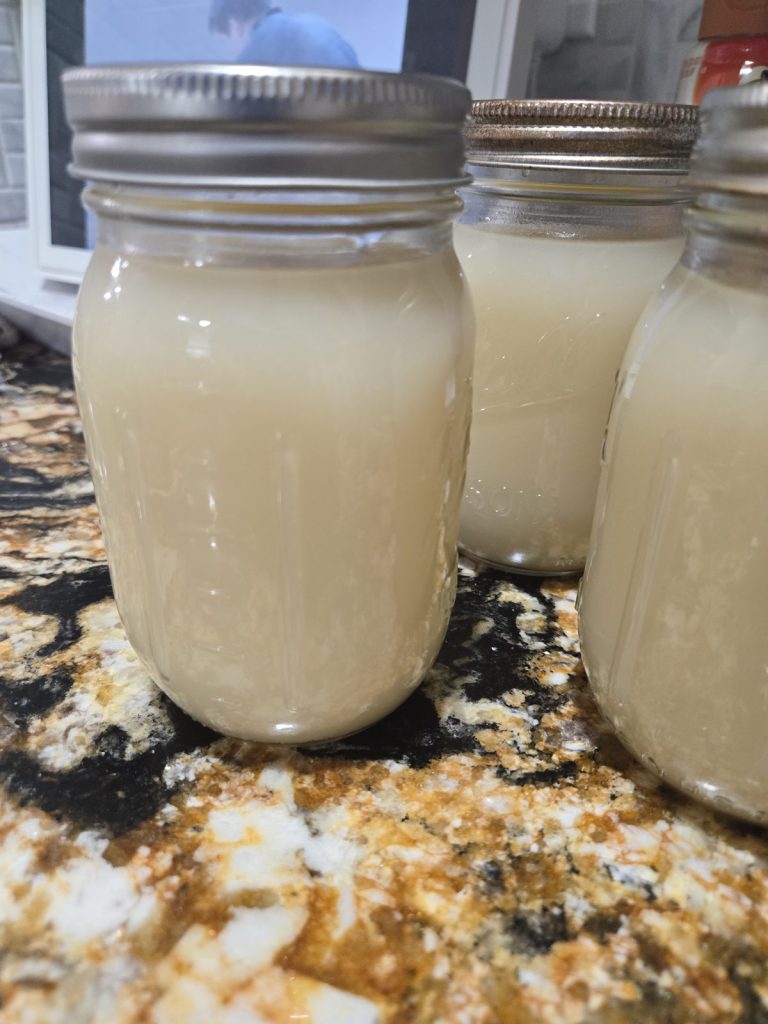 Jars of solid white beef tallow