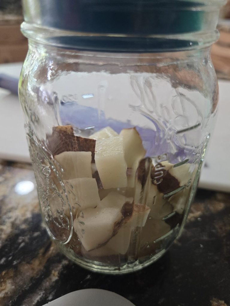 Layering cubed potatoes into a pint jar