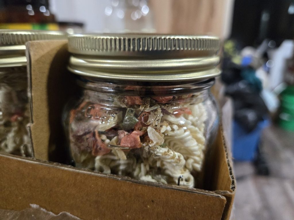 Jars of homemade soup mix packed in a box to give as gifts